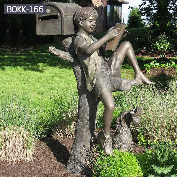 Bronze mailbox with little boy reading books outdoor decor
