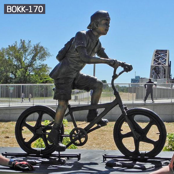 School boy ride on bicycle metal bronze outdoor sculptures for sale