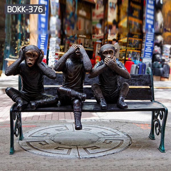 Modern street art bronze three monkey statues sitting on the bench for sale