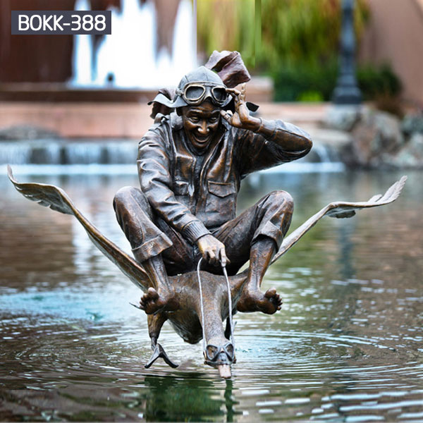 Outdoor bronze casting statues of man ride a crane for the pool decor