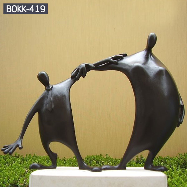 Two abstract bronze figure statues with base for yard decor
